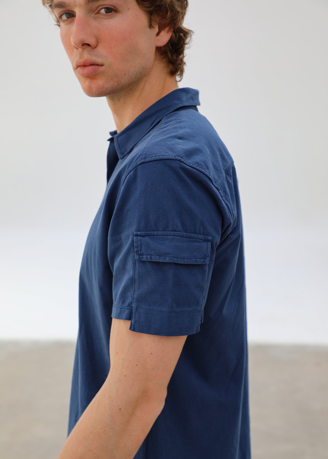 Short Modern Pocket Polo Blue